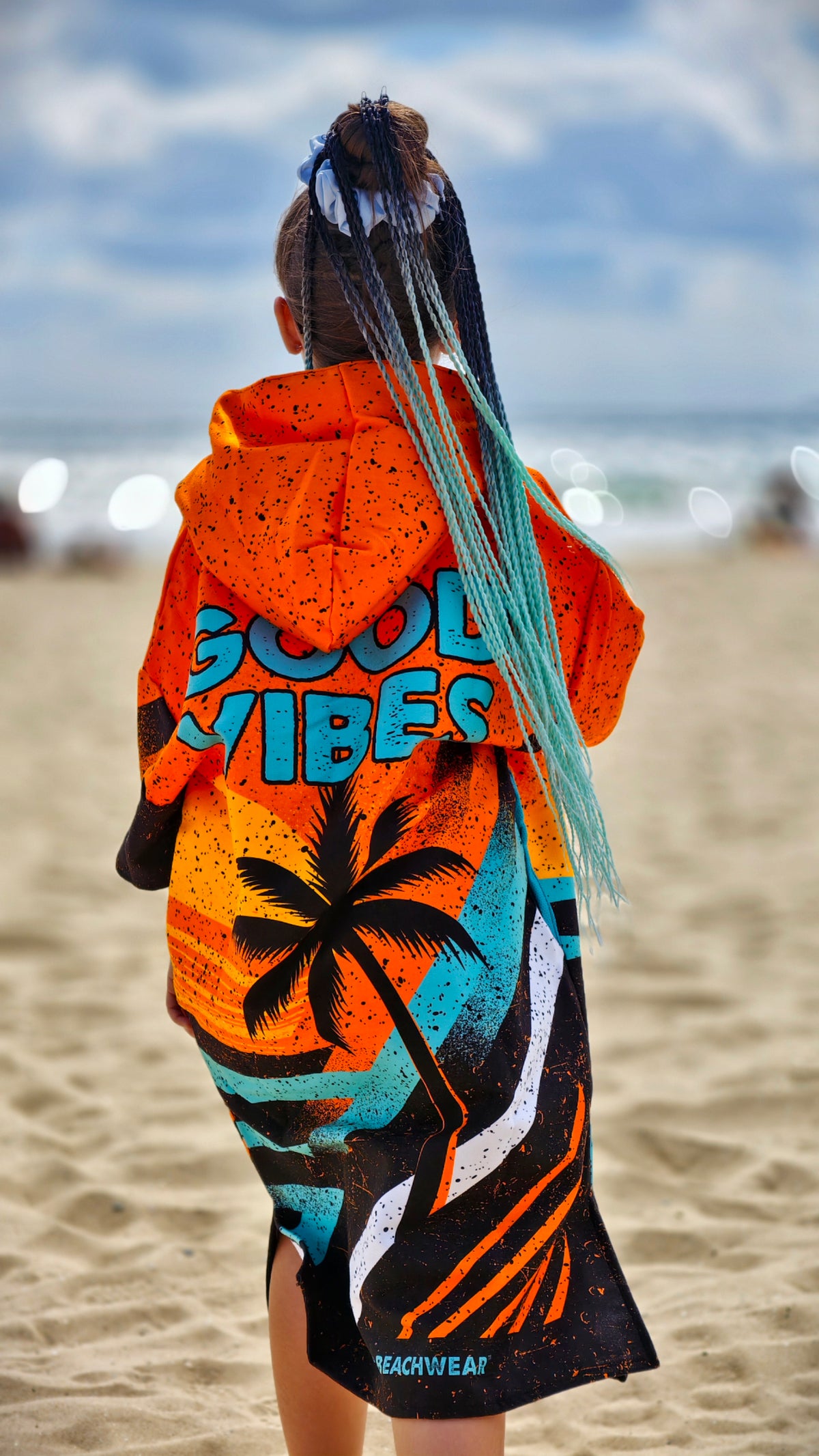 Orange Kinder-Strandponcho-Handtuch für Mädchen mit Kapuze, Reißverschluss und Taschen – CACAO Beachwear™
